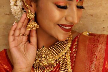 Exquisite portrait of a South Indian bride in traditional attire and jewelry.
